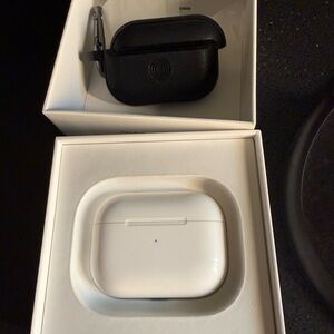 Genuine Apple AirPods Pro w/ extra black case box and lightening cord.
